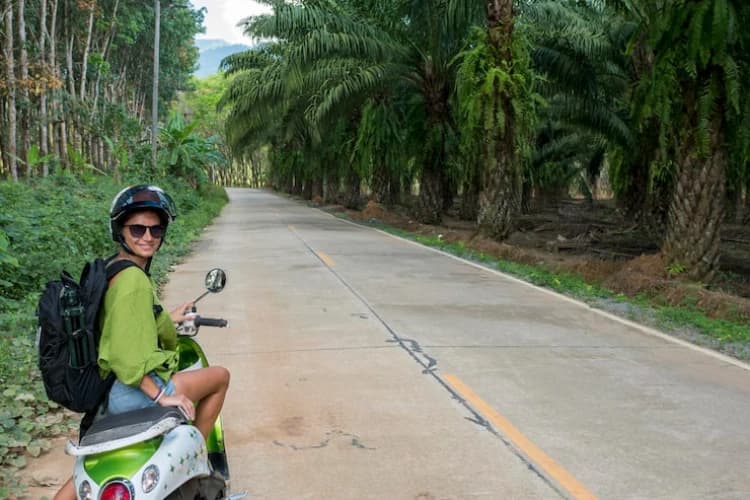 Scooter rider on a Bali road