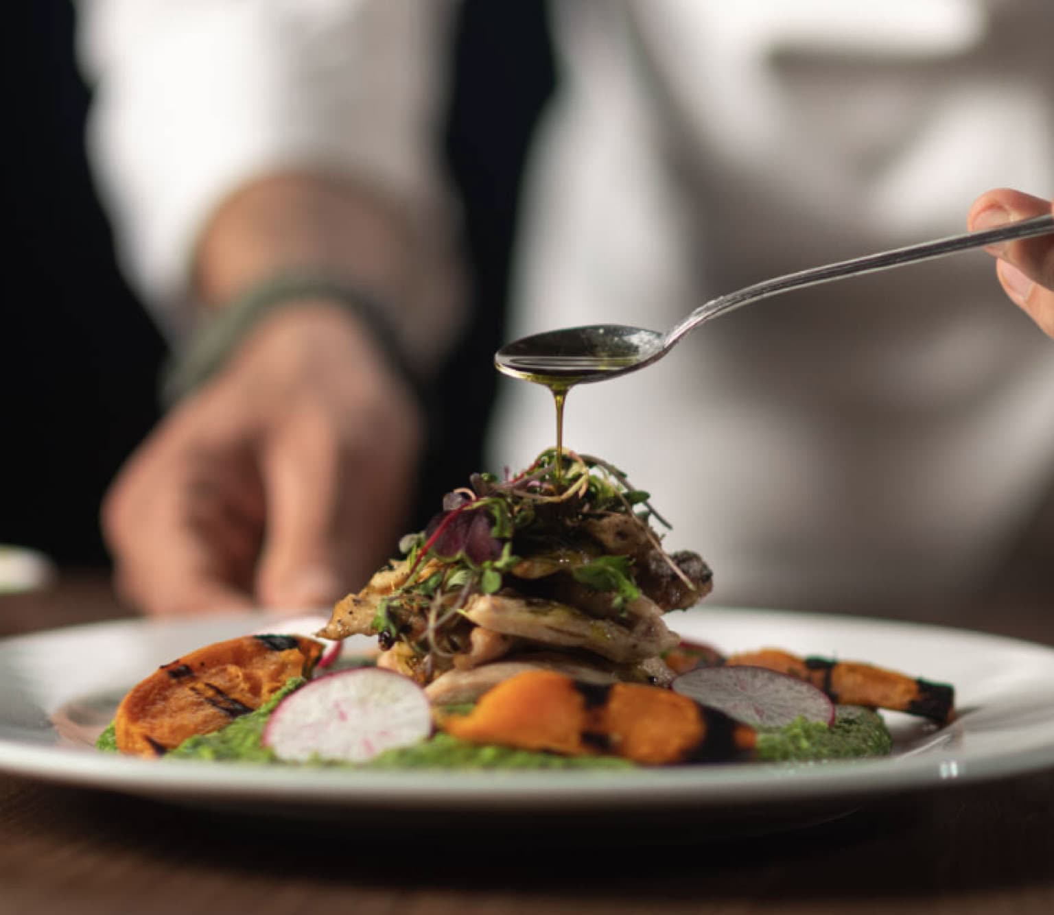 Private chef cooking with fresh ingredients