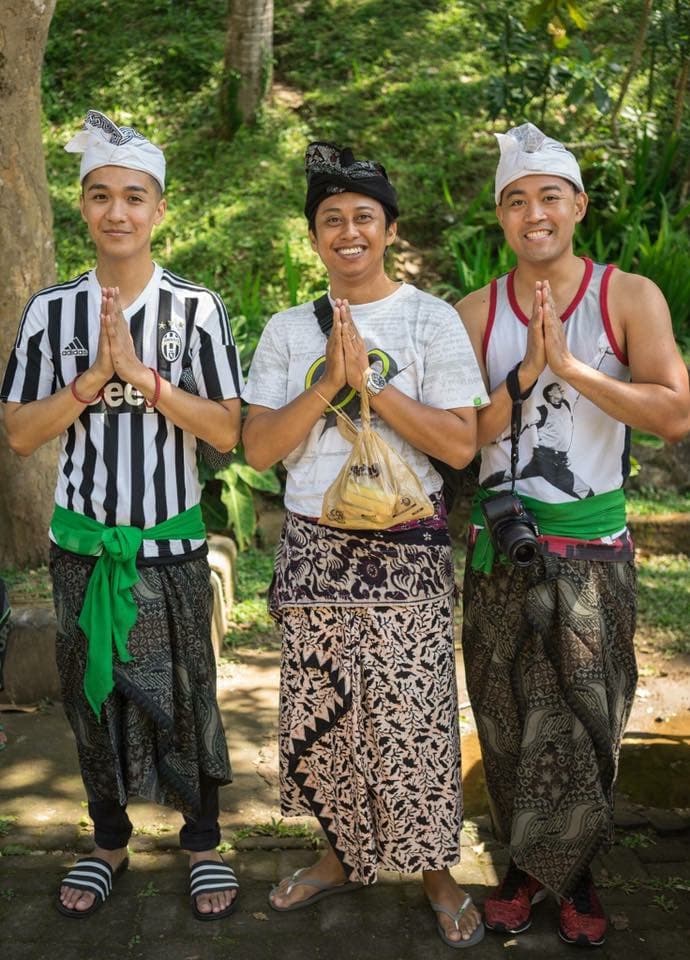 Bali temple landscape and local travel team